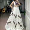 Women Off White & Purple Printed Rayon Gamthi Mirror Work Navratri Free Size Stitched Lehenga Choli Set