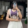 Women Off White & Purple Printed Rayon Gamthi Mirror Work Navratri Free Size Stitched Lehenga Choli Set