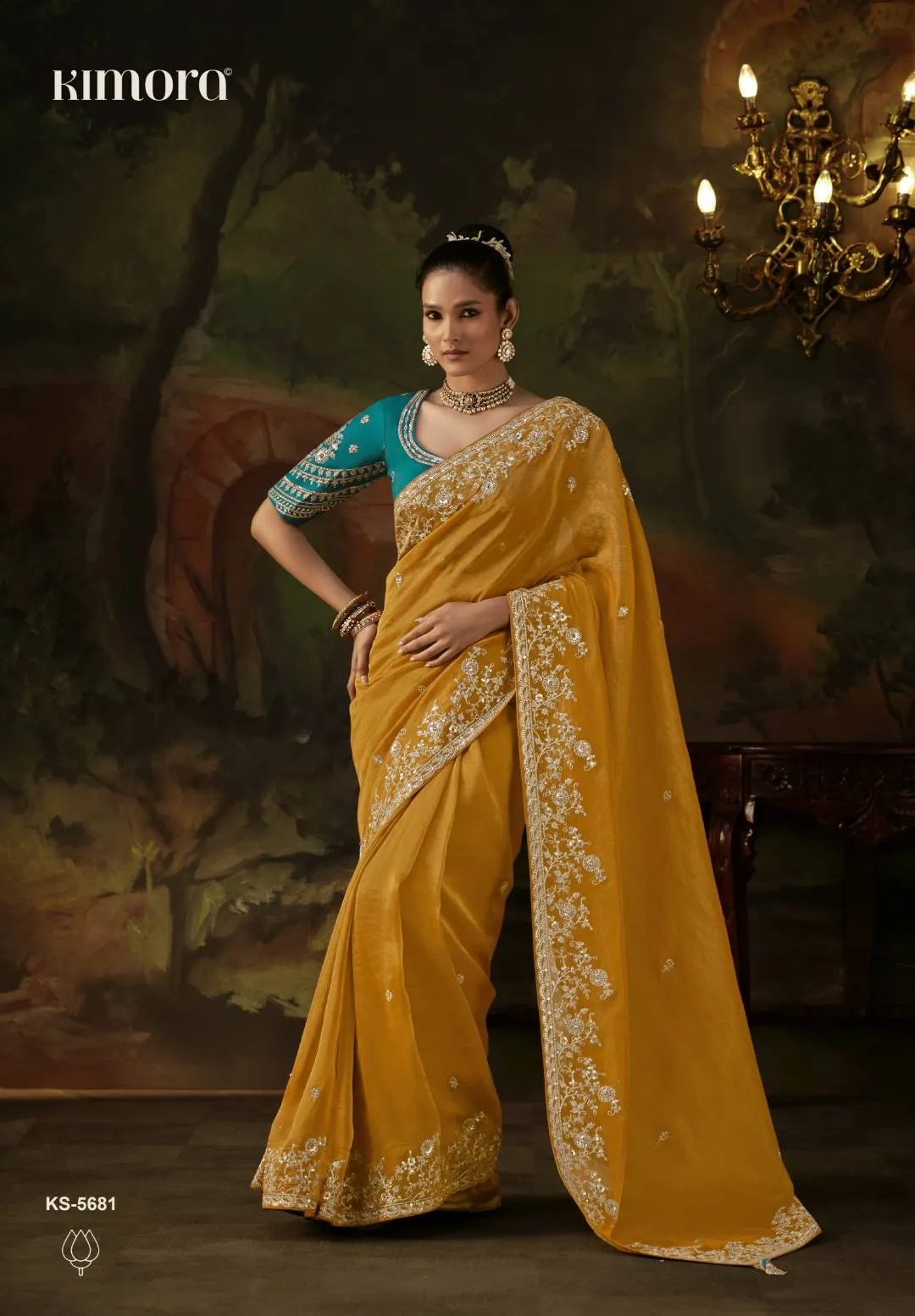 Kimora Gharana Mustard Yellow Tissue Silk Saree with Teal Blue Embroidered Blouse