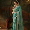 Kimora Gharana Viscose Zari Tissue Saree in Teal with Heavy Embroidered Pink Blouse