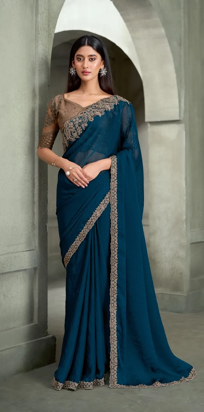 Peacock Blue Georgette Saree with Embroidered Border & Designer Blouse