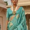 Sabyasachi Turquoise Silk Saree with Heritage Golden Elephant Motifs & Zari Pallu