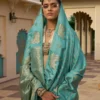 Sabyasachi Turquoise Silk Saree with Heritage Golden Elephant Motifs & Zari Pallu