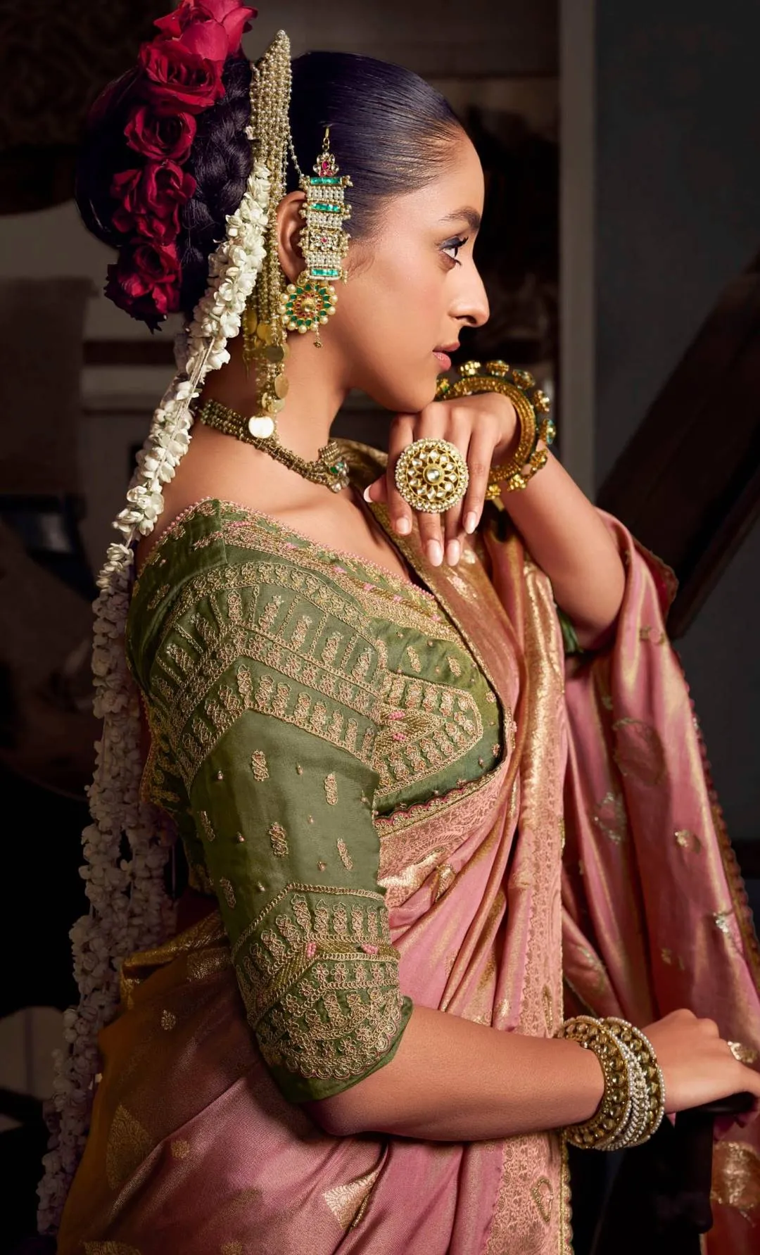 Woman's Salmon Pink Woven Viscose Tissue Silk Saree Paired With Contrast Green Blouse