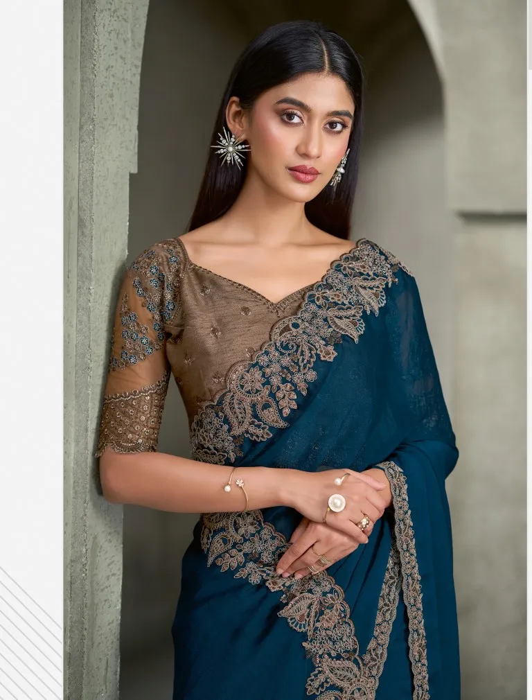 Peacock Blue Georgette Saree with Embroidered Border & Designer Blouse