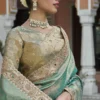 Woman’s Premium Green Kanjivaram Soft Silk Saree with Elegant Beads Work