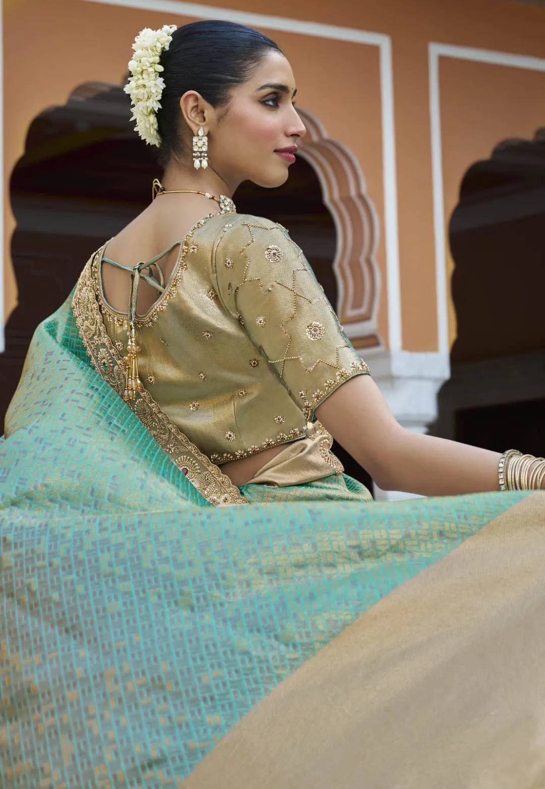 Woman’s Premium Green Kanjivaram Soft Silk Saree with Elegant Beads Work